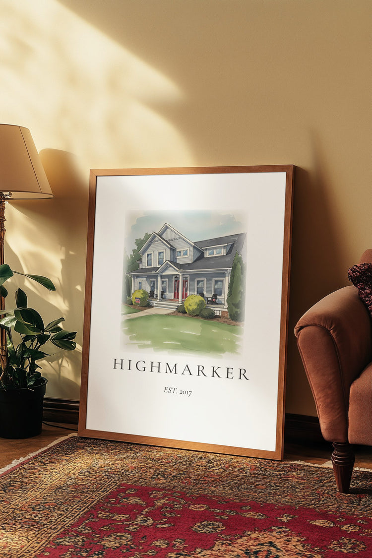 An ink and wash illustration of the Highmarker family home, framed and leaning against a warm living-room wall.
